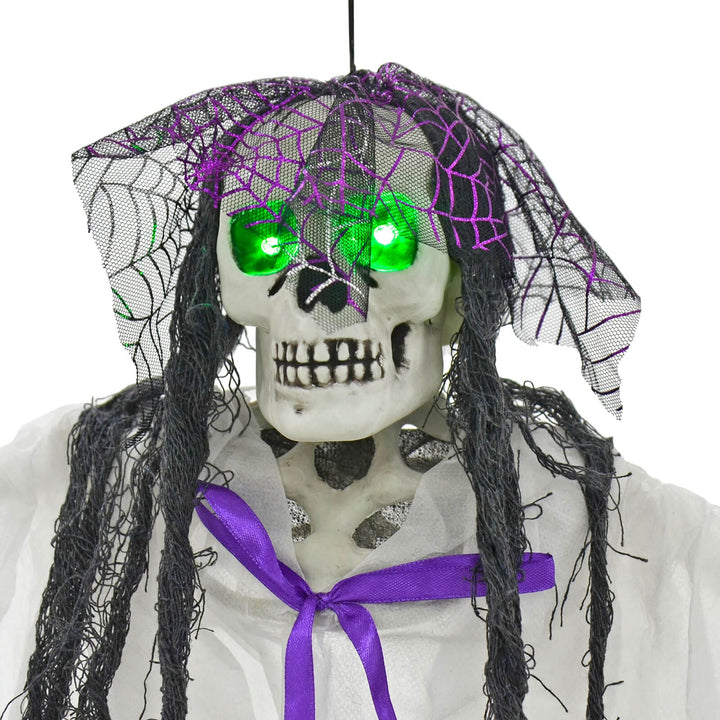 4ft Hanging Skeleton Flashing Eyes Purple Bow Webs Decoration