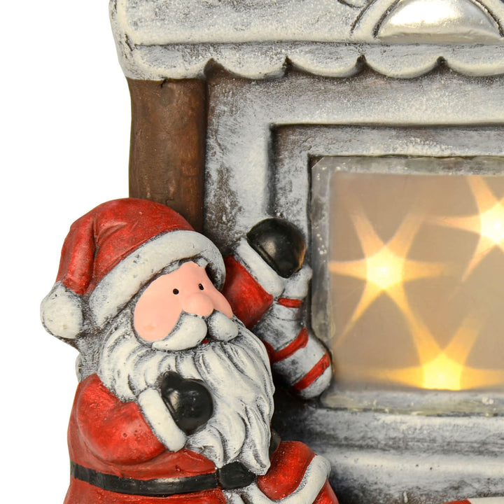 Santa At Fireplace LED Flashing Stars Christmas Decoration 30cm